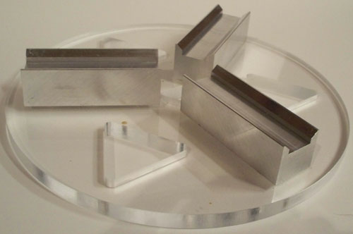 Bottom section of kinematic coupling showing just the grooves placed at 120 degrees apart.